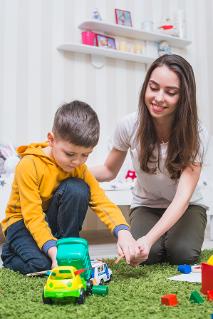 mother-playing-toy-car-with-boy.png